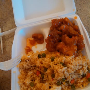 Chinese Gourmet Express - a take out container with rice and meat - Chinese Near Me - Puyallup, Washington