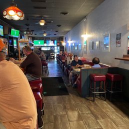 people sitting at the bar
