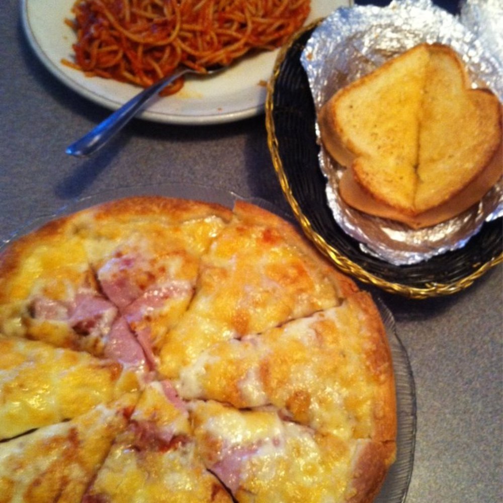 Palermo Family Restaurant - a plate of spaghetti and a pizza - Pizza Near Me - Calgary, Alberta Palermo Family Restaurant - a plate of spaghetti and a pizza - Pizza Near Me - Calgary, Alberta