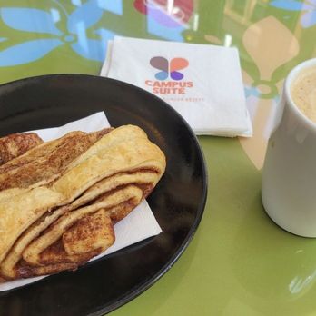 Campus Suite - Cinnamon roll and white chocolate mocha coffee. - Coffee & Tea Near Me - Kiel, SH Campus Suite - Cinnamon roll and white chocolate mocha coffee. - Coffee & Tea Near Me - Kiel, SH