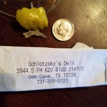 Schlotzsky's - My receipt and the shard of plastic I got with a dime for scale - Sandwiches Near Me - Bee Cave, Texas