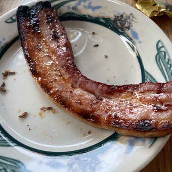 Peter Luger - Luger's Sizzling Bacon, Extra Thick by the Slice - Steakhouses Near Me - Brooklyn, New York Peter Luger - Luger's Sizzling Bacon, Extra Thick by the Slice - Steakhouses Near Me - Brooklyn, New York
