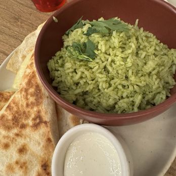 Carlitos Tequileria - Kids cheese quesadilla with cilantro lime rice 9/10 - Bars Near Me - West Nyack, New York Carlitos Tequileria - Kids cheese quesadilla with cilantro lime rice 9/10 - Bars Near Me - West Nyack, New York