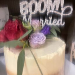 a cake with flowers on top a cake with flowers on top