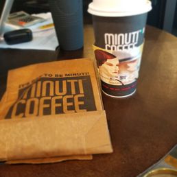 Flat white with almond pastry.