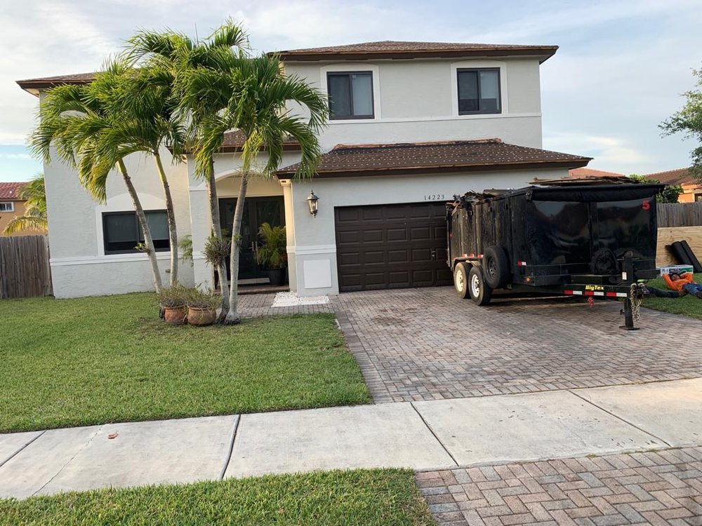 Slide of The Roof Xperts