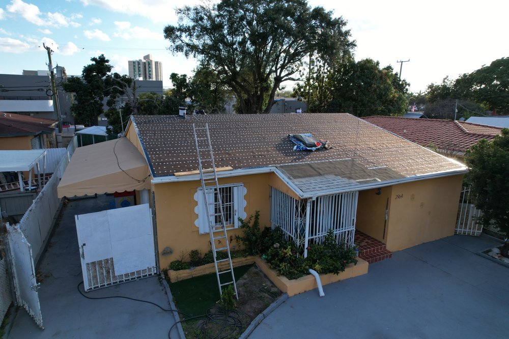 Slide of Nacs Roofing