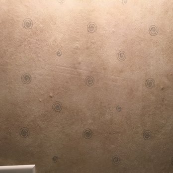 Travel Inn - The walls look stain, could be mold behind.  Smells musky and got this dirty look all around the room. - Hotels Near Me - Orange, Massachusetts