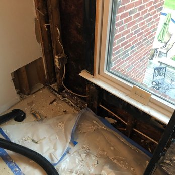 Exterior Source - Damage is exactly where clog was in the small section of gutters on back of house - Gutter Services Near Me - Chesapeake, Virginia