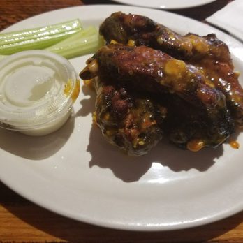 Whiskey River Pub and Grill - Smoked blue and gold wings - Pubs Near Me - Rochester, New York Whiskey River Pub and Grill - Smoked blue and gold wings - Pubs Near Me - Rochester, New York