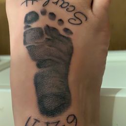 The tattoo Kenny did was painless and perfect matches my daughters foot print exactly