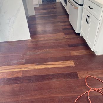 Mario Diaz Flooring - Before in front of wine rack. - Flooring Near Me Mario Diaz Flooring - Before in front of wine rack. - Flooring Near Me