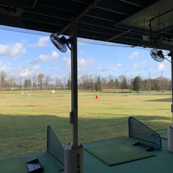 The Grounds Driving Range And Pro Shop - Outdoor covered and heated tees