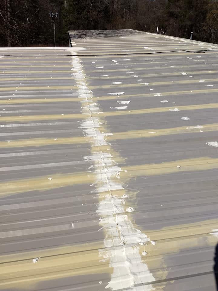 Slide of K & C Seamless Roofing