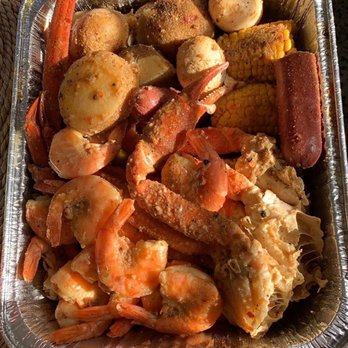 Stroke's Seafood - a container of shrimp, potatoes, and corn - Seafood Near Me - Sarasota, Florida Stroke's Seafood - a container of shrimp, potatoes, and corn - Seafood Near Me - Sarasota, Florida