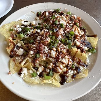 Morgan's Mill - Their nachos are very eclectic and unique with potato chips, balsamic vinegar, feta cheese, and green onions. - Coffee & Tea Near Me - Woodland, California Morgan's Mill - Their nachos are very eclectic and unique with potato chips, balsamic vinegar, feta cheese, and green onions. - Coffee & Tea Near Me - Woodland, California