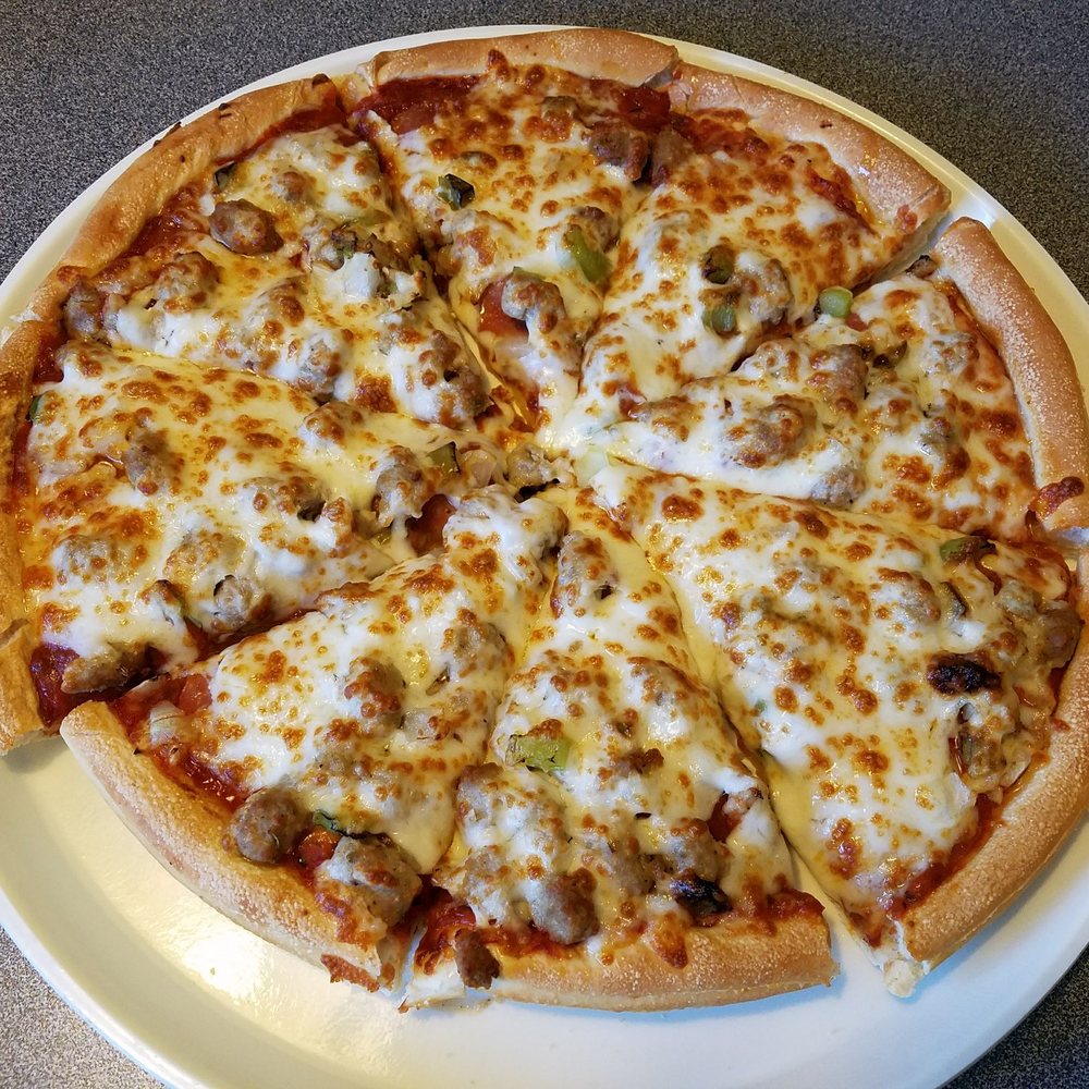 Humble pie (pepperoni, sausage, onions, green pepper) specialty pizza Humble pie (pepperoni, sausage, onions, green pepper) specialty pizza