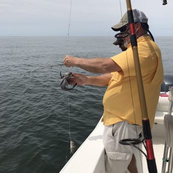 Angry Pelican Charters - Capt. Mark Greene jumps in and offers a helping hand! - Fishing Near Me - Oak Island, North Carolina