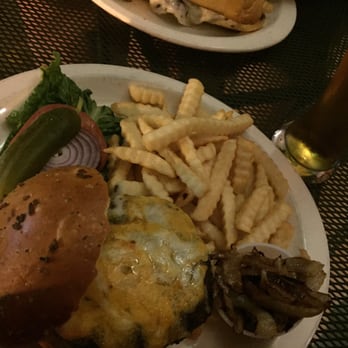 Christopher's - a plate of food and a glass of beer - Pubs Near Me - Huntington, New York
