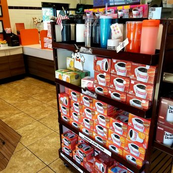 Dunkin' -  a display of coffee cups and coffee mugs - Donuts Near Me - Albany, Georgia