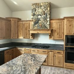 Auld's Cabinets - Custom hood / Knotty Alder