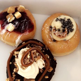 Five-O Donut Co - Cherry cheesecake, snitches get stitches(snickers), and cannoli - Donuts Near Me - Sarasota, Florida Five-O Donut Co - Cherry cheesecake, snitches get stitches(snickers), and cannoli - Donuts Near Me - Sarasota, Florida