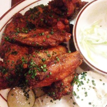CBG Bar & Grill - $22 for one dozen wings -- they were spicy and sauced well plus cooked "well done," but nearly overcooked to the point of being almost dry. - American Near Me - Portland, Maine