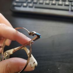 America's Best Contacts & Eyeglasses - A pin fell out which apparently makes them unfixable... I tried to fix it myself, no go.