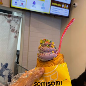 Somisomi - Ube + Black Sesame Swirl AhBoong with Taro filling, topped with Fruity Pebbles and sprinkles. - Desserts Near Me - Cupertino, California Somisomi - Ube + Black Sesame Swirl AhBoong with Taro filling, topped with Fruity Pebbles and sprinkles. - Desserts Near Me - Cupertino, California