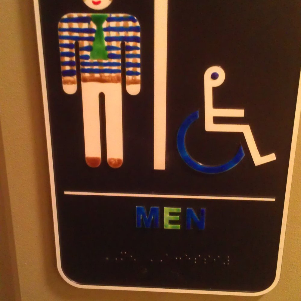 Connie's Kitchen - "Cute" little drawings on the bathroom sign. - Breakfast & Brunch Near Me - Wallingford, Connecticut