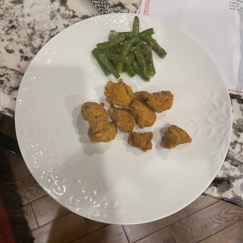 Texas Roadhouse - This is what we got for the critters meal. small and tough chicken nuggets, rolls without butter! Worst takeout order ever. - Steakhouses Near Me - Gainesville, Georgia