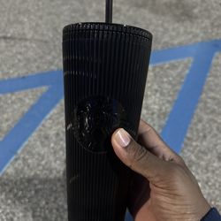 Starbucks - Star Bucks Cup with an iced coffee inside