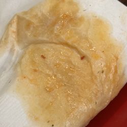 Grease off a small piece of pizza