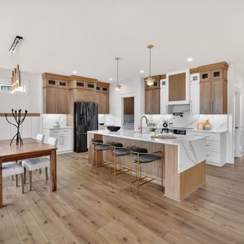 Lily Ann Cabinets - Temperance - Bright kitchen with Craftsman White Shaker and Craftsman Natural Shaker cabinets, a waterfall island, and warm wood accents. - Cabinetry Near Me - Temperance, Michigan Lily Ann Cabinets - Temperance - Bright kitchen with Craftsman White Shaker and Craftsman Natural Shaker cabinets, a waterfall island, and warm wood accents. - Cabinetry Near Me - Temperance, Michigan