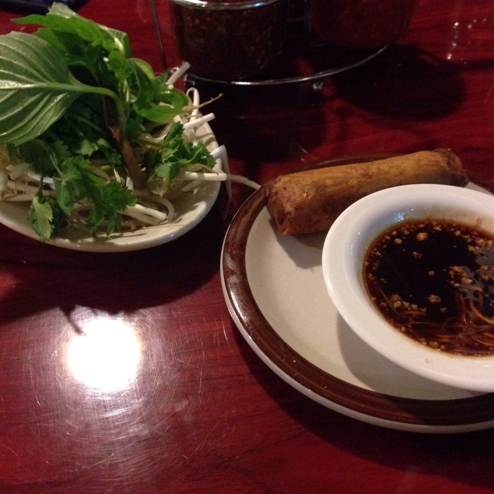 Linh's Bistro - Spring roll with delicious mystery sauce and even more mysterious greens. - Vietnamese Near Me - Dayton, Ohio Linh's Bistro - Spring roll with delicious mystery sauce and even more mysterious greens. - Vietnamese Near Me - Dayton, Ohio