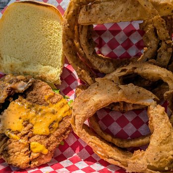 Wholly Cow - Wholly Clucker Chicken Sandwich with Onion Rings - Burgers Near Me - Austin, Texas Wholly Cow - Wholly Clucker Chicken Sandwich with Onion Rings - Burgers Near Me - Austin, Texas