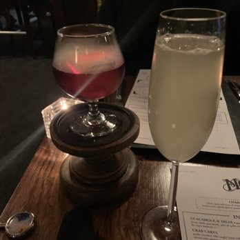 Divani - two glasses of wine on a table - Wine Bars Near Me - Grand Rapids, Michigan