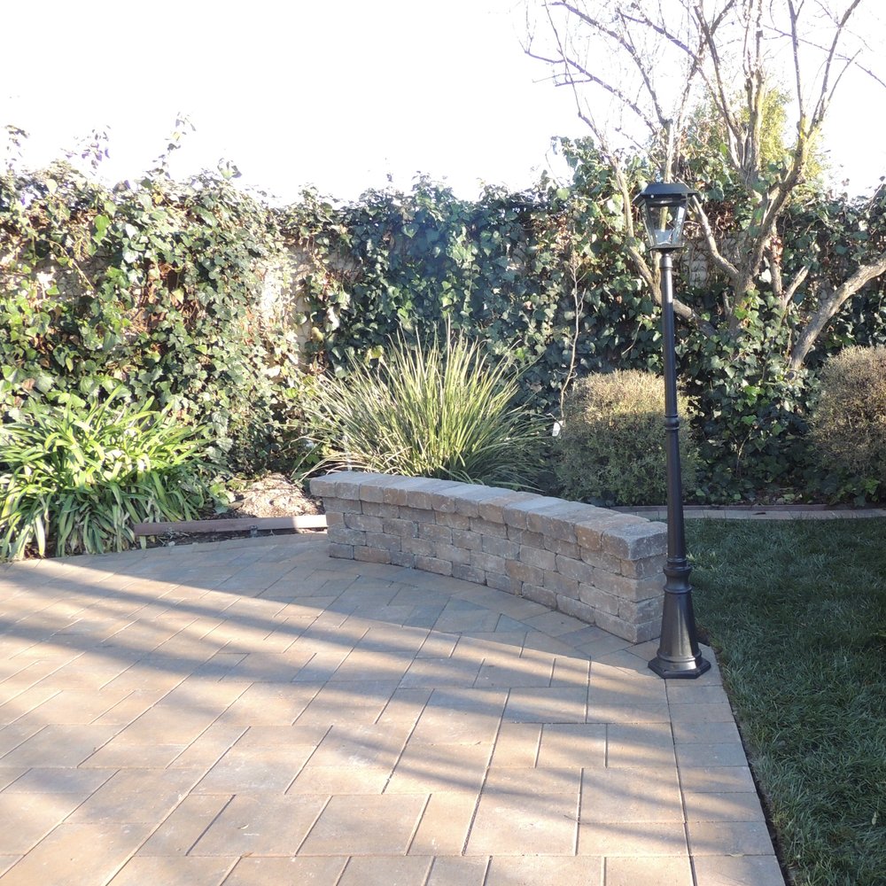 Backyard paver work done by Federal Paving Systems.