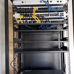 DV's Tech Solutions - 18U install with Unifi devices, 30 drops total in a home.