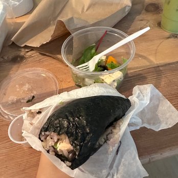 Ashbox - a person holding a burrito and a salad - Coffee & Tea Near Me - Brooklyn, New York