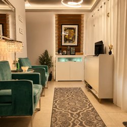 Isarat's Men's Spa - "Welcoming reception area at ISARAT'S Men's Spa, providing a clean, comfortable and relaxing experience from the moment you arrive."