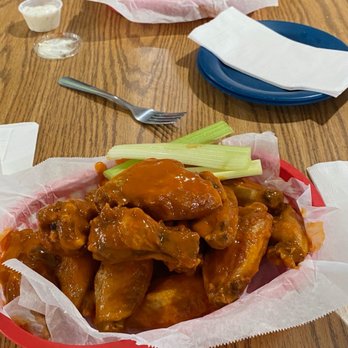 Wings'n Things - Gold fever wings in the front and spicy bbq in the back of the picture. - Chicken Wings Near Me - Houston, Texas