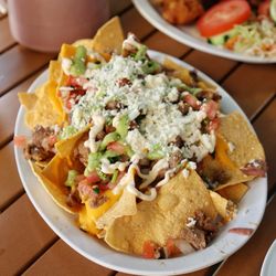 Super nachos with asada
