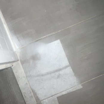 Quality Inn & Suites - Spray paint on the floor from where they tried to cover up the mold on the walls with paint - Hotels Near Me - Ruther Glen, Virginia