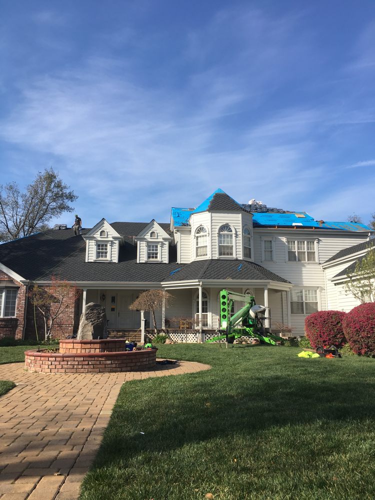 Slide of Prestige Roofing Solutions