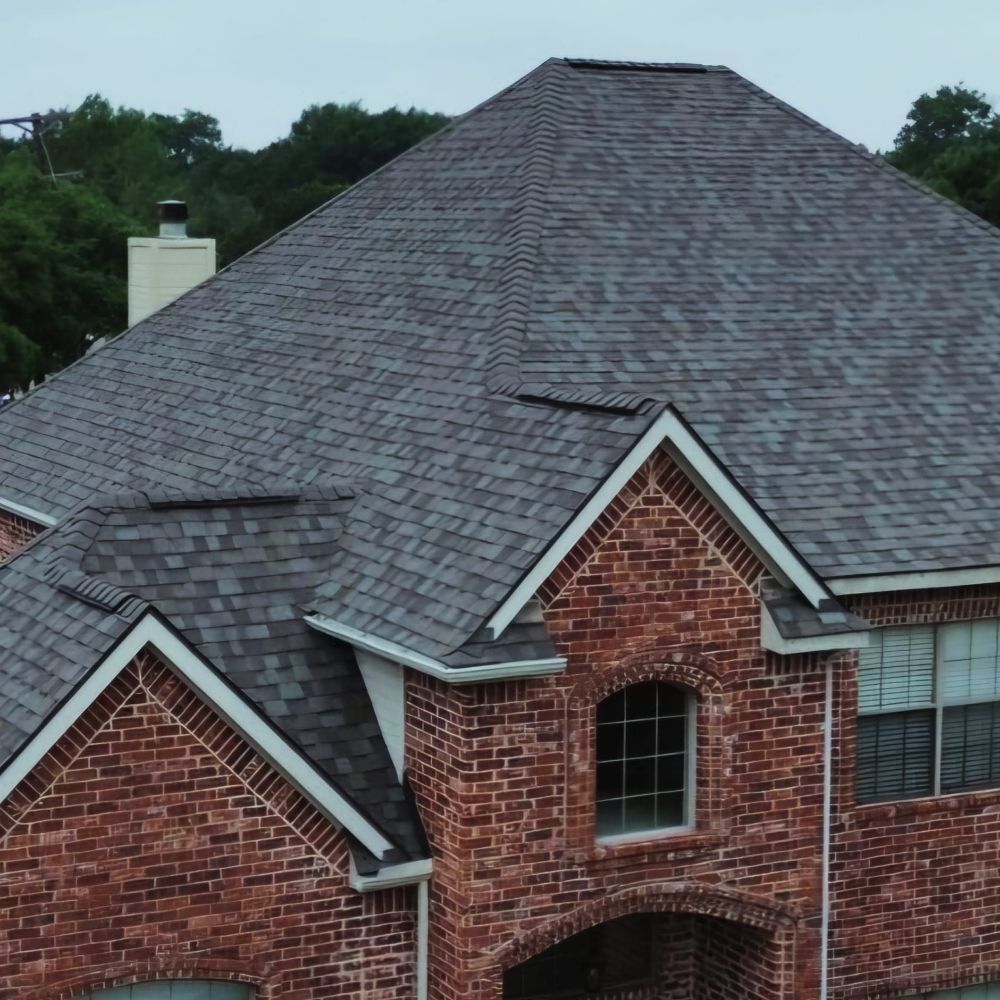 Slide of RE Roofing and Construction