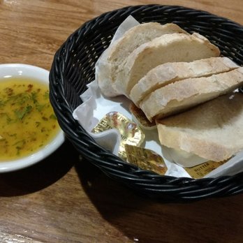 Rizzi's Restaurant - Warm fresh bread with excellent dipping sause - Italian Near Me - Rochester, New York Rizzi's Restaurant - Warm fresh bread with excellent dipping sause - Italian Near Me - Rochester, New York