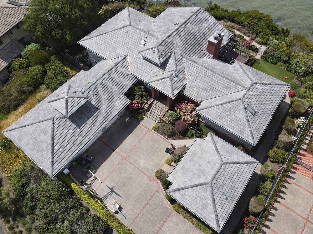 Slide of Apollo Roofing Company