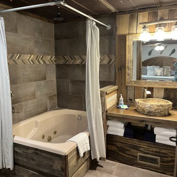 Bear Camp Cabin Rentals - Bathroom off the king bedroom on main floor. - Vacation Rentals Near Me - Pigeon Forge, Tennessee