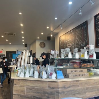 Coffee Rx - a coffee shop counter with a menu on the wall - Coffee & Tea Near Me - Brooklyn, New York